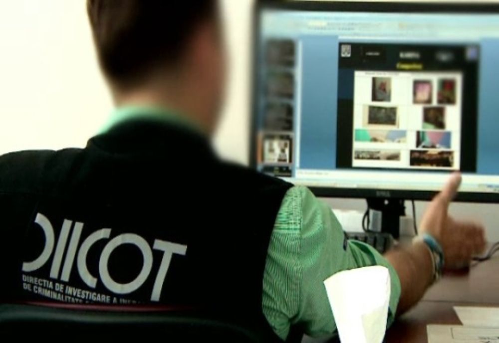 Percheziție în Ilfov pentru fraude informatice